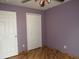 Bedroom with hardwood floors and a closet at 1247 Petronia St, North Port, FL 34286