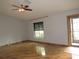 Comfortable living room showcasing hardwood floors and natural light at 1247 Petronia St, North Port, FL 34286