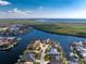 A beautiful aerial shot showcasing waterfront homes along the river with ocean views at 1339 Casey Key Dr, Punta Gorda, FL 33950
