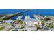 Aerial view of a marina with numerous boats, and stunning views of the harbor and cityscape at 1339 Casey Key Dr, Punta Gorda, FL 33950