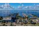 Aerial view showcasing waterfront homes, boat docks, and a marina with picturesque views at 1339 Casey Key Dr, Punta Gorda, FL 33950