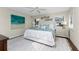 Serene bedroom featuring a king-size bed, soft linens, and coastal-inspired decor for a relaxing retreat at 1339 Casey Key Dr, Punta Gorda, FL 33950