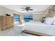 Bedroom with great natural light, waterfront view, and sliding glass doors to lanai at 1339 Casey Key Dr, Punta Gorda, FL 33950