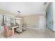 Charming dining room with ample natural light, stylish furnishings, and tile flooring at 1339 Casey Key Dr, Punta Gorda, FL 33950