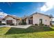 Well-maintained home has a stone facade, manicured lawn, and a neatly landscaped front yard at 1339 Casey Key Dr, Punta Gorda, FL 33950