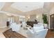 Cozy living room with plush white seating, hardwood floors, and ample natural light for a relaxing atmosphere at 1339 Casey Key Dr, Punta Gorda, FL 33950