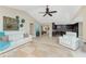 Open-concept living room with vaulted ceilings, tile flooring, and seamless transition to the kitchen at 1339 Casey Key Dr, Punta Gorda, FL 33950