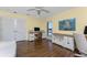 Bright home office with hardwood floors, neutral paint, and abundant natural light at 1339 Casey Key Dr, Punta Gorda, FL 33950