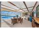 Expansive outdoor living area with pool, offers the perfect space for entertaining and relaxing by the water at 1339 Casey Key Dr, Punta Gorda, FL 33950