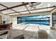 Enclosed pool with great view of the bay and surrounded by comfortable furniture at 1339 Casey Key Dr, Punta Gorda, FL 33950