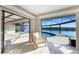 Cozy sunroom offers picturesque views of the pool and serene waterfront at 1339 Casey Key Dr, Punta Gorda, FL 33950