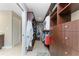 Large walk-in closet with custom shelving, drawers, and hanging space for clothes at 1339 Casey Key Dr, Punta Gorda, FL 33950