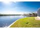 Serene waterfront view showcasing lush greenery and the tranquil waterway at 1339 Casey Key Dr, Punta Gorda, FL 33950