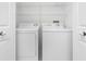 Convenient laundry area featuring a full-size washer and dryer at 2000 Bal Harbor Blvd # 1-111, Punta Gorda, FL 33950