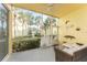 Screened patio with comfortable seating and tropical views, creating a relaxing outdoor space at 2000 Bal Harbor Blvd # 1-111, Punta Gorda, FL 33950