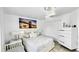 Serene bedroom featuring elegant decor, soft lighting, and ample closet space at 2325 Hanford Ln, North Port, FL 34288