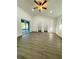 Spacious bedroom featuring hardwood floors, ceiling fan, recessed lights, and closet at 4128 Durant St, Port Charlotte, FL 33948