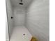 Spacious walk-in shower with sleek, large-format tiles and modern fixtures at 4128 Durant St, Port Charlotte, FL 33948