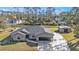 Inviting home exterior with a well-maintained yard and attached two-car garage at 4175 Horseshoe Ave, North Port, FL 34286
