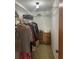 Spacious walk-in closet featuring hanging racks and storage space for organizing clothes and personal items at 432 Olivia Rd, Venice, FL 34293