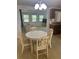 Charming dining area with views to a living space, showcasing the open floor plan and natural light at 432 Olivia Rd, Venice, FL 34293