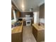 Functional kitchen design with classic white appliances and ample counter space for meal preparation at 432 Olivia Rd, Venice, FL 34293