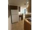 Kitchen featuring bright appliances, ample cabinet space and a functional layout for meal preparation at 432 Olivia Rd, Venice, FL 34293