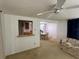 Open-concept living space with a dining area and pass-through kitchen bar at 432 Olivia Rd, Venice, FL 34293