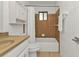 Classic bathroom features a single sink vanity with ample mirror, and a shower/tub combo at 5909 Talbrook Rd, North Port, FL 34287