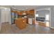 Open kitchen layout with granite counters, stainless steel appliances, and tiled backsplash at 5909 Talbrook Rd, North Port, FL 34287