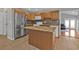 Kitchen with granite counters, stainless steel appliances, and tiled backsplash at 5909 Talbrook Rd, North Port, FL 34287
