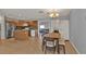 Open kitchen layout with granite counters, stainless steel appliances, and tiled backsplash at 5909 Talbrook Rd, North Port, FL 34287