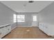 Bright and airy living room with tile floors, neutral walls, and modern cabinets at 5909 Talbrook Rd, North Port, FL 34287
