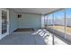 Screened-in patio providing a relaxing outdoor space, offering fresh air and a shaded area at 5909 Talbrook Rd, North Port, FL 34287