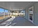 Screened-in patio provides an outdoor space, offering fresh air and a shaded area at 5909 Talbrook Rd, North Port, FL 34287