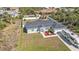 A high angle view of the property location in a residential neighborhood with many trees at 11338 Willmington Blvd, Port Charlotte, FL 33981