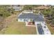 Well maintained home with a front lawn, driveway, and a large area to park an RV or boat at 11338 Willmington Blvd, Port Charlotte, FL 33981