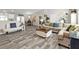 Open living space with modern floors and access to dining area is bright, open and airy at 11338 Willmington Blvd, Port Charlotte, FL 33981