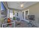 Porch featuring comfortable seating and view of the backyard at 11338 Willmington Blvd, Port Charlotte, FL 33981