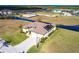 Stunning aerial view of the home showcasing its prime waterfront location at 17122 Barcrest Ln, Punta Gorda, FL 33955