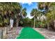 Community boat ramp surrounded by lush vegetation; easy access to the water at 17122 Barcrest Ln, Punta Gorda, FL 33955