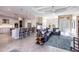 Expansive living space with a kitchen island and dining area, offering great flow and functionality at 17122 Barcrest Ln, Punta Gorda, FL 33955