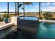 Beautiful pool with spa and lush landscaping at 17122 Barcrest Ln, Punta Gorda, FL 33955