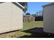 Backyard featuring a shed, patio area, and a privacy fence at 21456 Holdern Ave, Port Charlotte, FL 33952