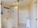Bathroom featuring tile floors, single sink vanity and standing shower at 21456 Holdern Ave, Port Charlotte, FL 33952