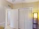 Bedroom featuring closet with bi-fold doors and tile flooring at 21456 Holdern Ave, Port Charlotte, FL 33952