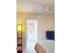 Bedroom featuring a ceiling fan and private ensuite bathroom at 21456 Holdern Ave, Port Charlotte, FL 33952