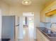 Efficient kitchen with stainless steel appliances and ample cabinet space at 21456 Holdern Ave, Port Charlotte, FL 33952