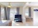 Bright living area with large windows, tile floors, and neutral decor at 21456 Holdern Ave, Port Charlotte, FL 33952