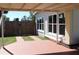 Exterior of home features a wooden fence and multiple windows at 21456 Holdern Ave, Port Charlotte, FL 33952